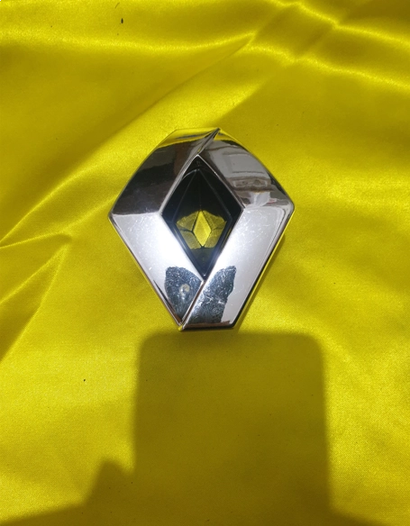 resimler/genel/Renault 19 Panjur Arması Ön 7700832974 YERLİ ÜRÜN